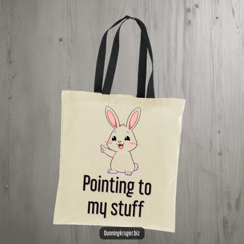 Funny tote bag featuring a happy rabbit with long ears pointing confidently at an empty space, perfect for carrying everyday items.